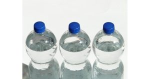 НАП реагира на 135% скок в цените на минералната вода, КЗК отчита високи надценки